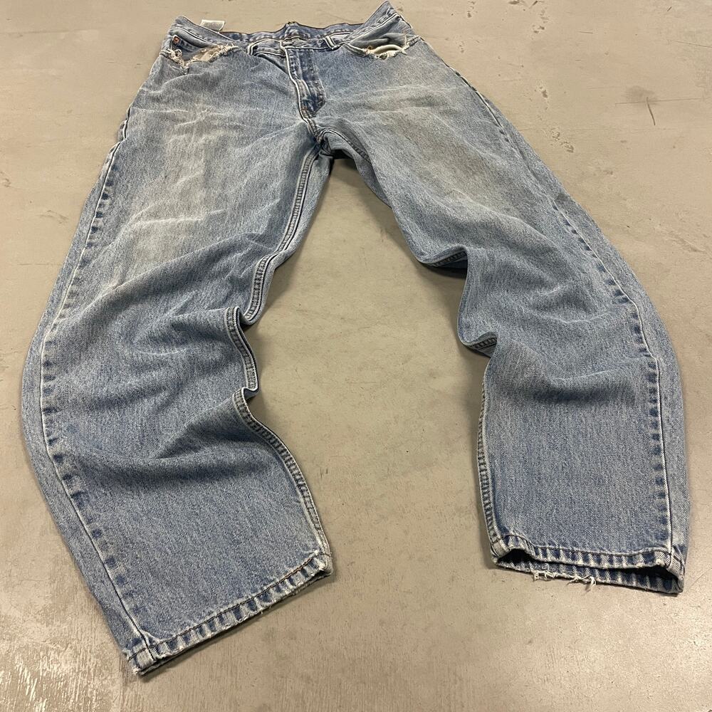 Y2K Levi’s 560 distressed baggy jeans 33x34